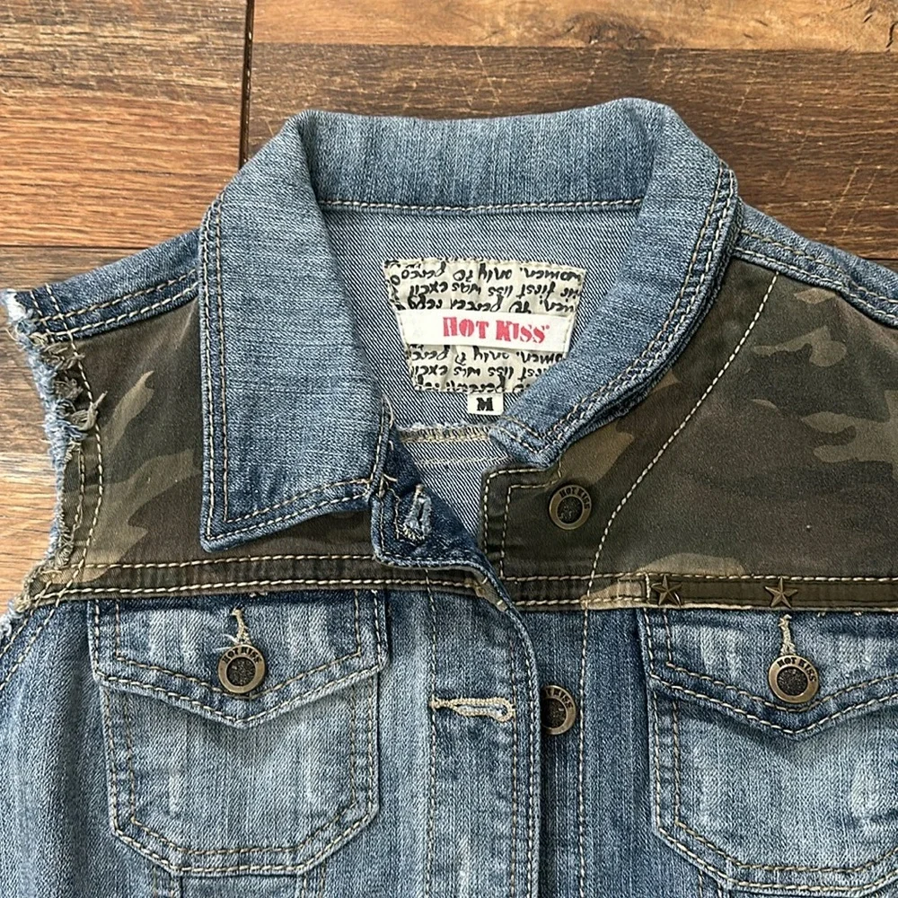 Hot Kiss denim and camo vest. Super cute to dress up or down. Sz medium